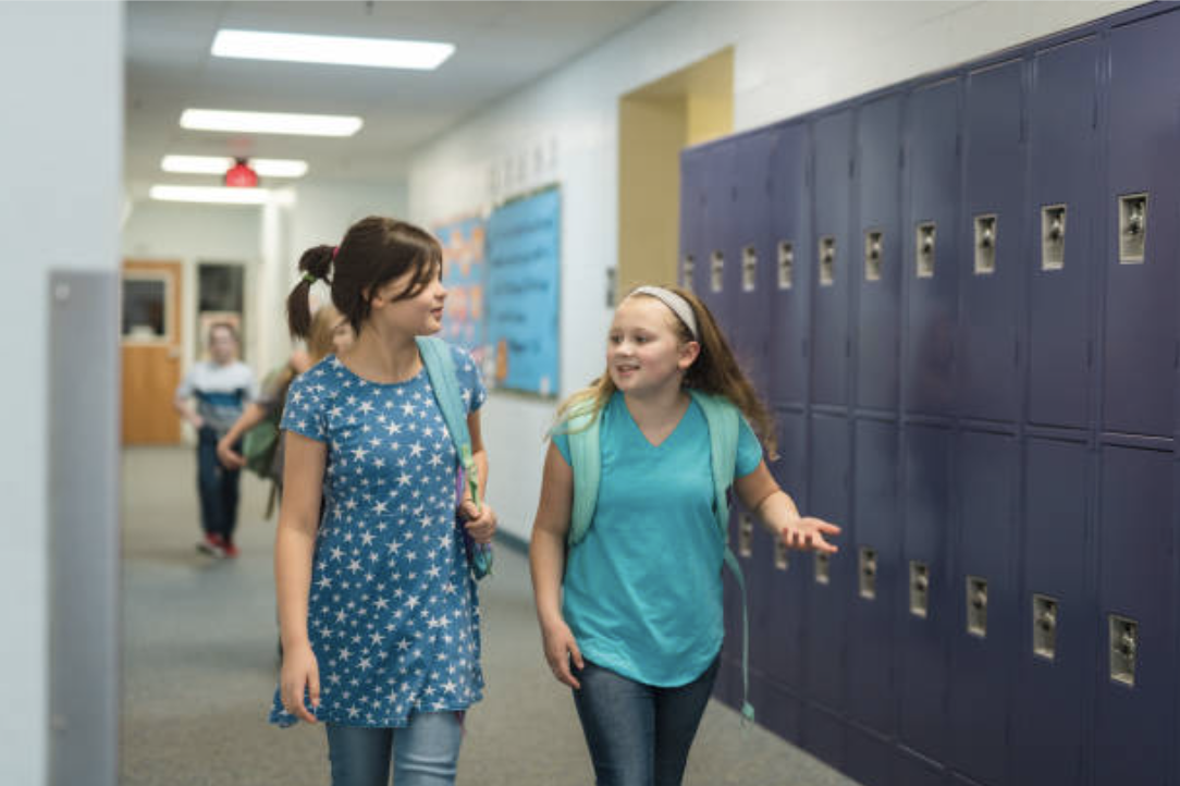 Students talking in corridor